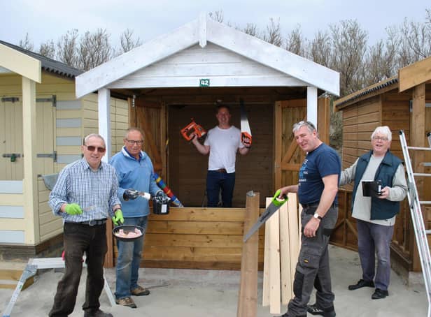 Chichester Rotarians Ray Richardson, Peter Haydn Jones, Tim Reedman, Neil Hughes and Trevor Ware, kitting out Chichester Boys Club’s new beach hut at West Wittering beach