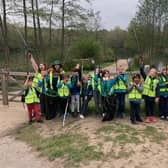 The 1st Southwater Sea Scouts during their litter pick at Southwater Country Park SUS-210519-125452001