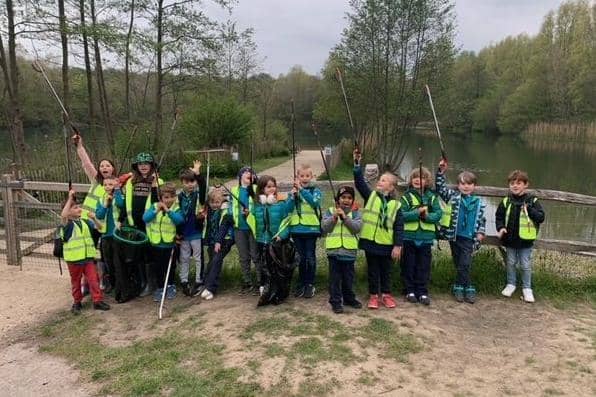 The 1st Southwater Sea Scouts during their litter pick at Southwater Country Park SUS-210519-125452001