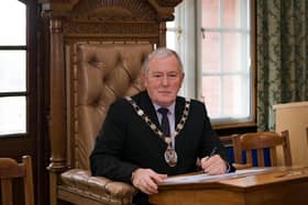 Rother District Council’s chairman Cllr Brian Drayson signing the Community Governance Order SUS-210222-113710001