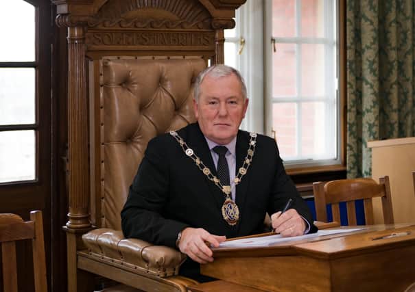 Rother District Council’s chairman Cllr Brian Drayson signing the Community Governance Order SUS-210222-113710001