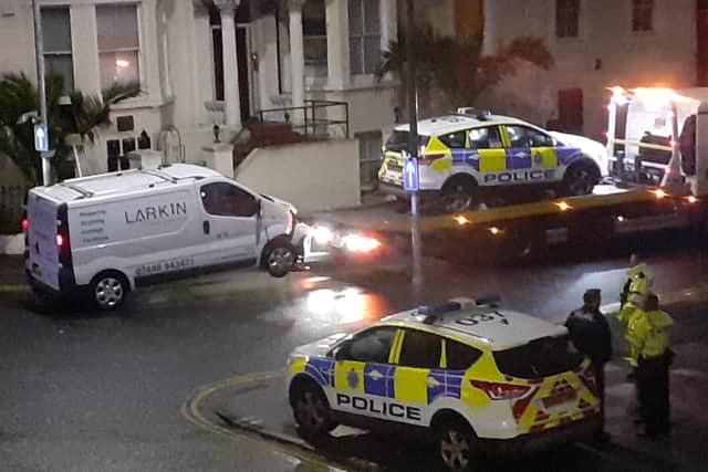 Eastbourne town centre road closed after police car collides with two vans