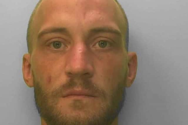 MichaelStanley, 31, was released on licence part-way through a sentence for assault occasioning actual bodily harm. Photo: Sussex Police