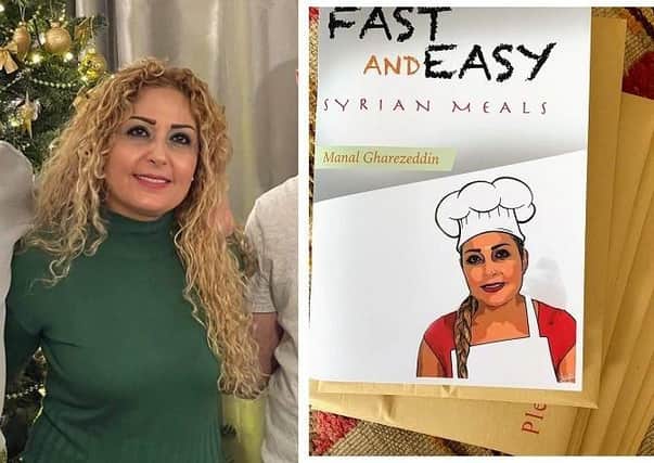 Manal Gharez, with her cookbook
