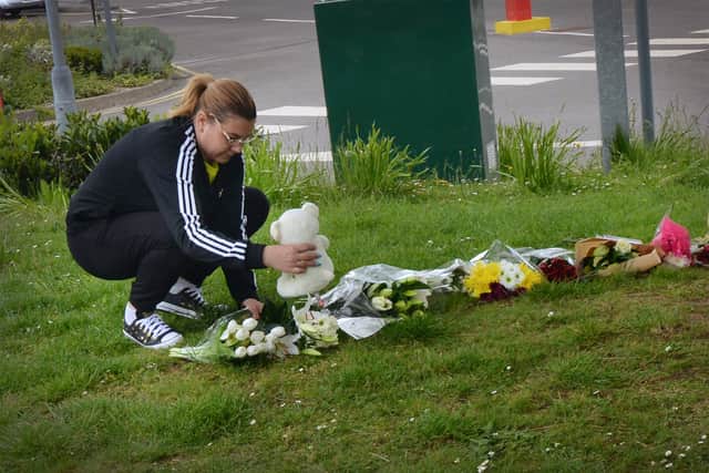 Floral tributes at Bexhill Academy May 25 2021. SUS-210525-123135001