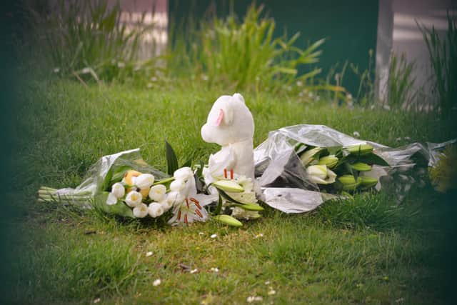 Floral tributes at Bexhill Academy May 25 2021. SUS-210525-123200001