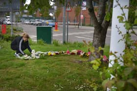Floral tributes at Bexhill Academy May 25 2021. SUS-210525-123147001