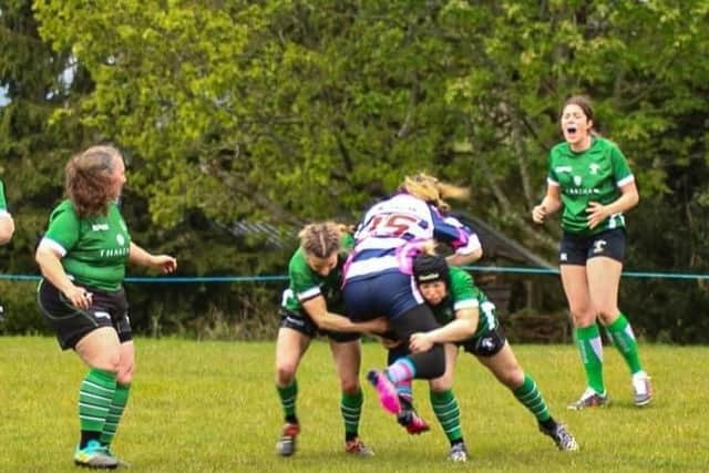 A crunching tackle from the Lionesses in their clash with East Grinstead