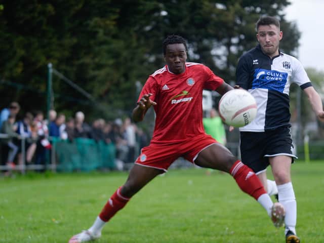 Shaq Gwengue on the ball for Worthing at East Preston, where the fans were able to watch them again / Picture: Marcus Hoare