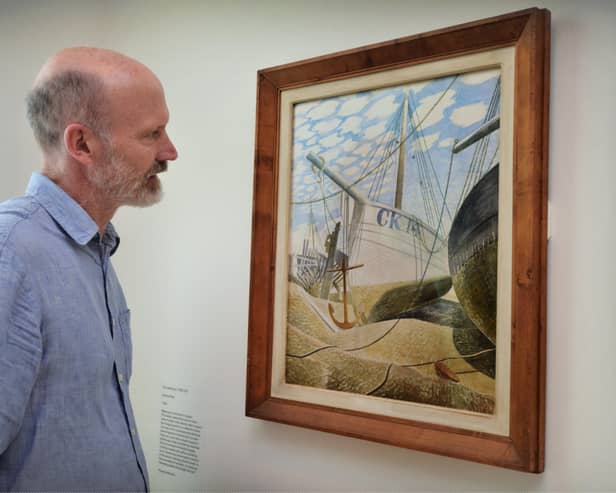 Art historian and curator James Russell with Mackerel Sky by Eric Ravilious. Photograph: Justin Lycett/ hn14902 (3)