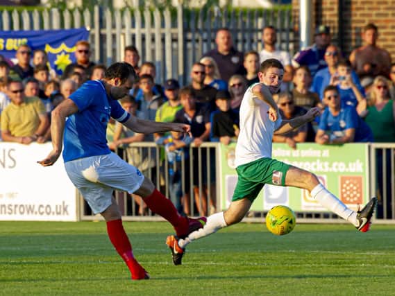 Brett Pitman shoots during Pompey's 2019 visit / Picture: Tommy McMillan