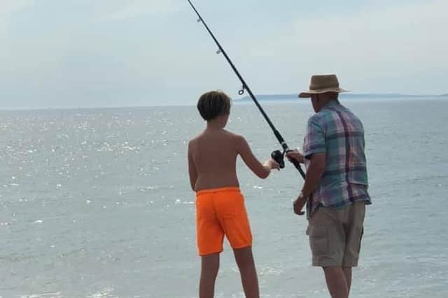 Harrison and his grandad fishing in Selsey
