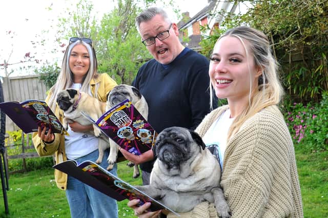 Tim Southwell with Beth Pembridge, Chloe Brasier, his pugs and his new comic Pugs In Space. Picture: Steve Robards, SR2105272