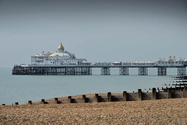 Eastbourne pier taken from the beach next to Royal Parade. SUS-200813-122838001