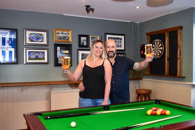 Landlords Paul and Gabby in the new games area of the pub, which opens on June 4