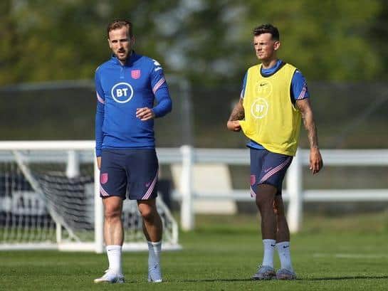 Ben White (right) training with England skipper Harry Kane