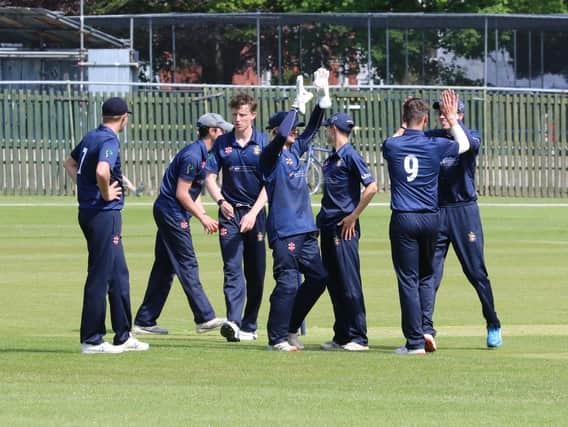 Eastbourne CC celebrate removing Matthew Whippey in their win over Brighton that took them top / Picture: Joe Knight