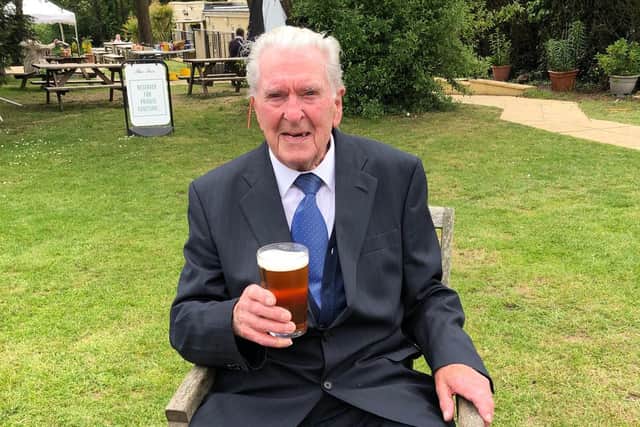 George Underwood celebrates his birthday with a pint at The Fox in Patching