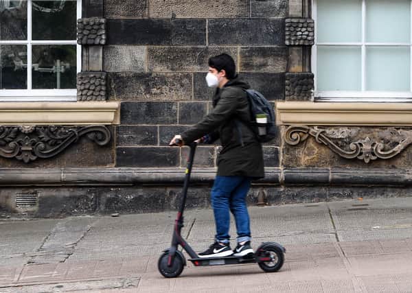 An e-scooter Photo by ANDY BUCHANAN/AFP via Getty Images