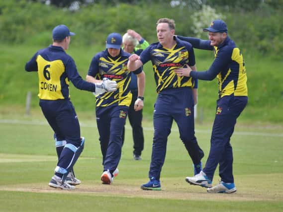 Hastings celebrate a wicket against Preston Nomads