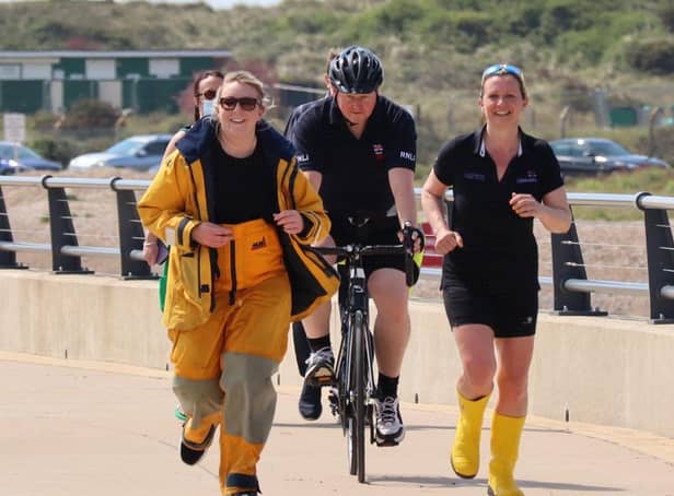 From left, Hannah Presgrave, Ian Foden and Bea Homer running and cycling in Littlehampton as part of their epic fundraising challenge. Picture: RNLI/Beth Brooks