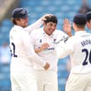 Dan Ibrahim is congratulated on a wicket - that after making history as the youngest  half-century maker the county championship has ever seen / Picture: Getty