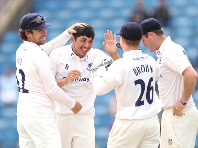 Dan Ibrahim is congratulated on a wicket - that after making history as the youngest  half-century maker the county championship has ever seen / Picture: Getty