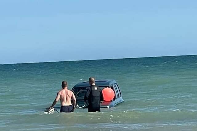 By the time the team reached the vehicle, the tide had come in.