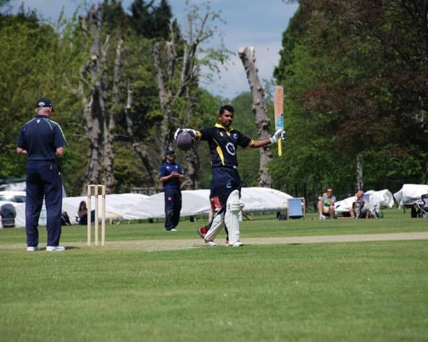 Nipun Karunanayake celebrates his 100 in Cuckfield CC's shock win over Eastbourne CC. Picture courtesy of Cuckfield Cricket Club