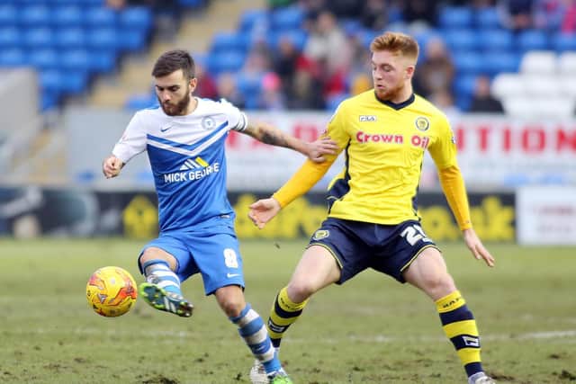 Jack Payne (left) in action for Peterborough United in 2015. Picture by Joe Dent/JMP