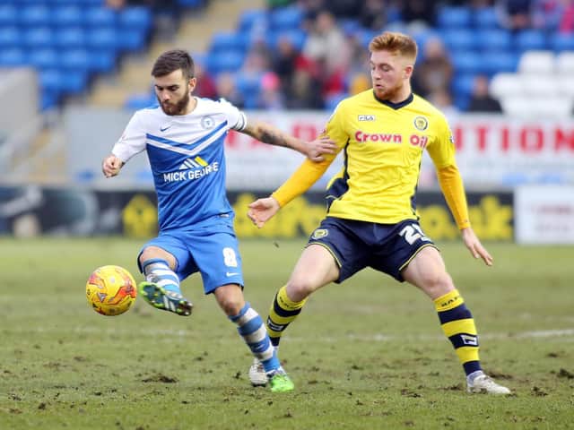 Jack Payne (left) in action for Peterborough United in 2015. Picture by Joe Dent/JMP
