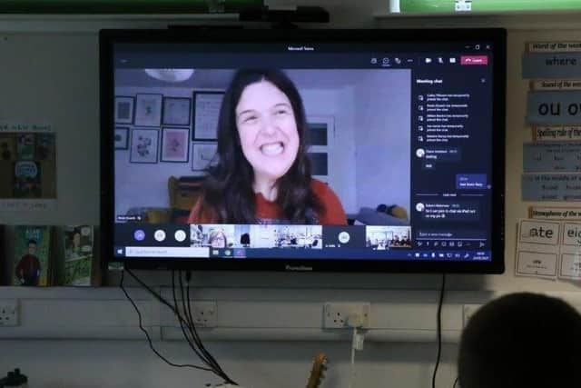 Rosie Jones speaks to Woodlands Meed pupils on screen. Picture: Woodlands Meed