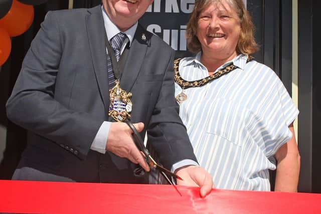 Worthing mayor Lionel Harman, accompanied by mayoress Karen Harman, cuts the ribbon at Columbia House in Durrington. Picture: Derek Martin Photography