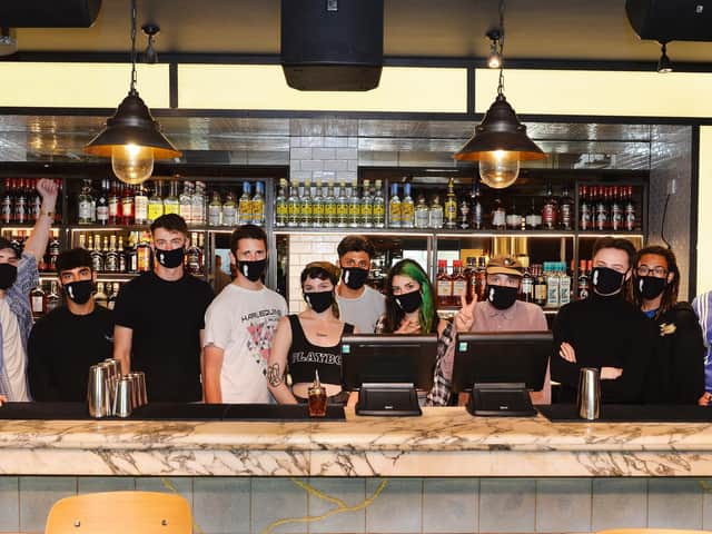 Staff are ready to welcome customers inside the Rum Kitchen in Black Lion Street, Brighton.
Picture by Jon Rigby