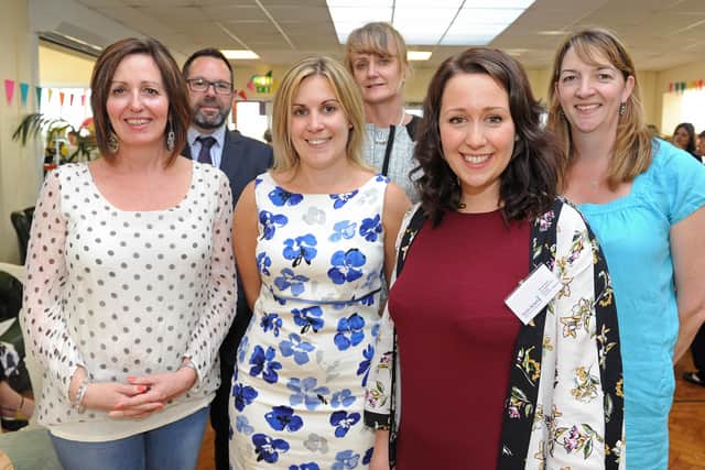 Rebecca Dean (pictured second from right), co-founder of The Girls' Network, is honoured with an MBE for services to female empowerment and young girls.