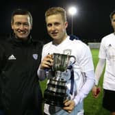 Sam Beard, pictured holding the Under-18s Dennis Probee Youth Cup, has gone on to play for Barnet and Dorking Wanderers after graduating from Loxwood's youth teams