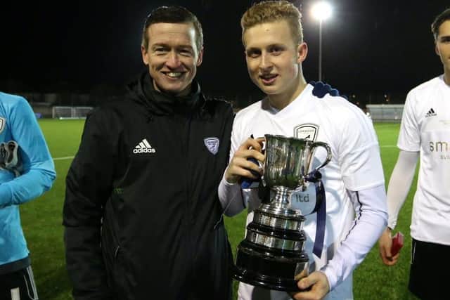 Sam Beard, pictured holding the Under-18s Dennis Probee Youth Cup, has gone on to play for Barnet and Dorking Wanderers after graduating from Loxwood's youth teams