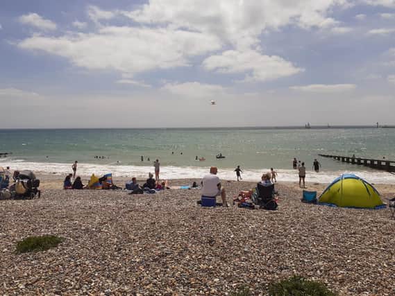 People enjoying the beach in Littlehampton today