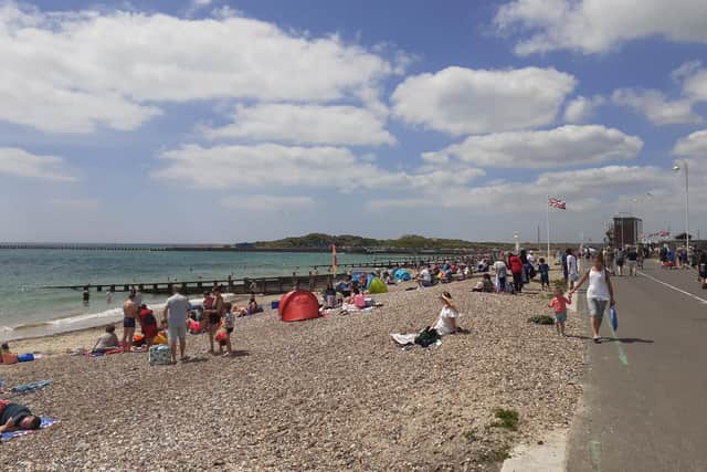 People enjoying the beach in Littlehampton today