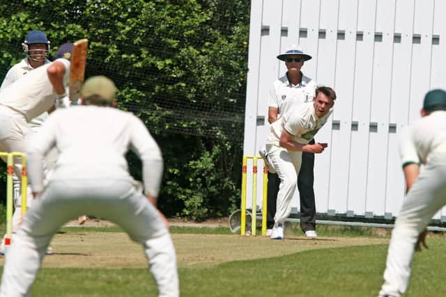 Connor Golding bowling for Three Bridges in their win against Eastbourne