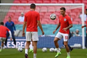 Brighton's Ben White warms up at Wembley ahead of England vs Croatia
