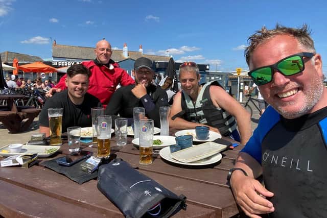 Jack (middle) was on his way home with four of his, Littlehampton jet ski club, friends when he spotted someone was in trouble in the water. Pictured with Jack are Ben Smart, Tony Watts, Keith waters and Gary Pinkney