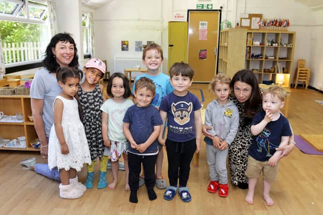 Lucy Forrester and Sofia Mattlock with children at the Eastbourne Montessori School at The Hub on the Hill. (Photo by Jon Rigby) SUS-210615-164912001