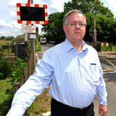 Lee White, Managing Director of Sterling Transport Consulting at Adversane level crossing. Pic S Robards SR2106155 SUS-210615-171242001