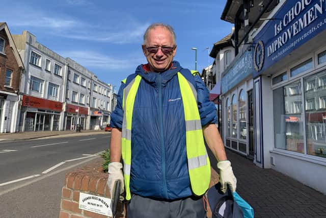 Andy Newton-Prince volunteers to pick up litter throughout the community
