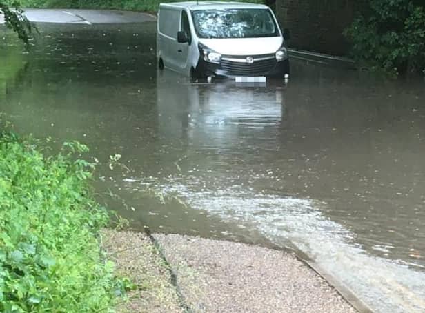 A van takes a dip in Cripplegate Lane 'swimming pool'.