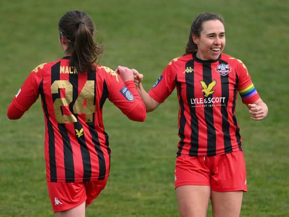 Skipper and multiple 2020-21 Player of the Season award winner Rhian Cleverly (right) has committed to Lewes Women for next season. Picture by Mike Hewitt/Getty Images