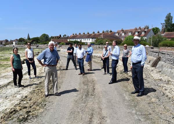 John Nelson, Chair of the Chichester Harbour Trust (front centre) and Jonson Cox, Chair of Ofwat (front right) host representatives from the key environmental agencies in Bosham (Credit: Keith Sinclair)