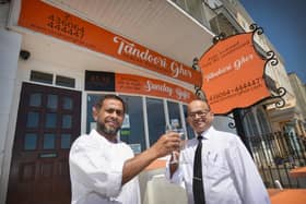 Tandoori Ghor in St Leonards is celebrating 25 years in business.L-R Fazlu Miah (chef) and owner Abu Ahmed SUS-210706-140345001