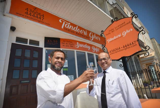 Tandoori Ghor in St Leonards is celebrating 25 years in business.

L-R Fazlu Miah (chef) and owner Abu Ahmed SUS-210706-140345001
